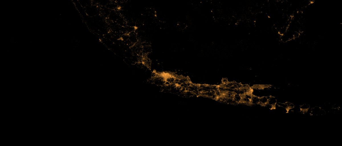 Java and Sumatra at night from orbit, amber city lights